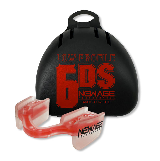 Red 6DS Low Profile Mouthguard displayed with a protective case in the background, showcasing its sleek design and durability.